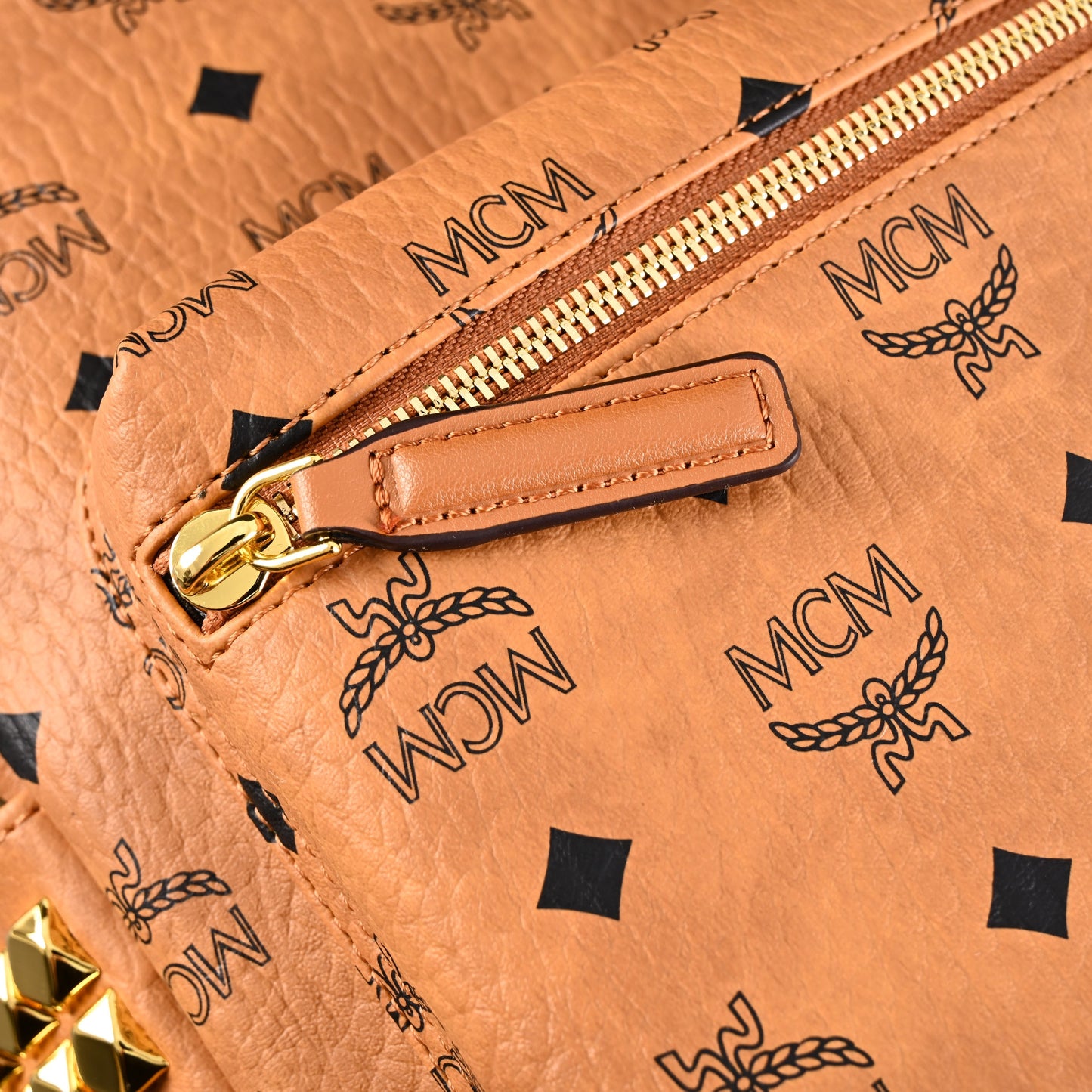 MCM Stark Visetos Medium Backpack – Cognac Monogram with Gold-Tone Studs